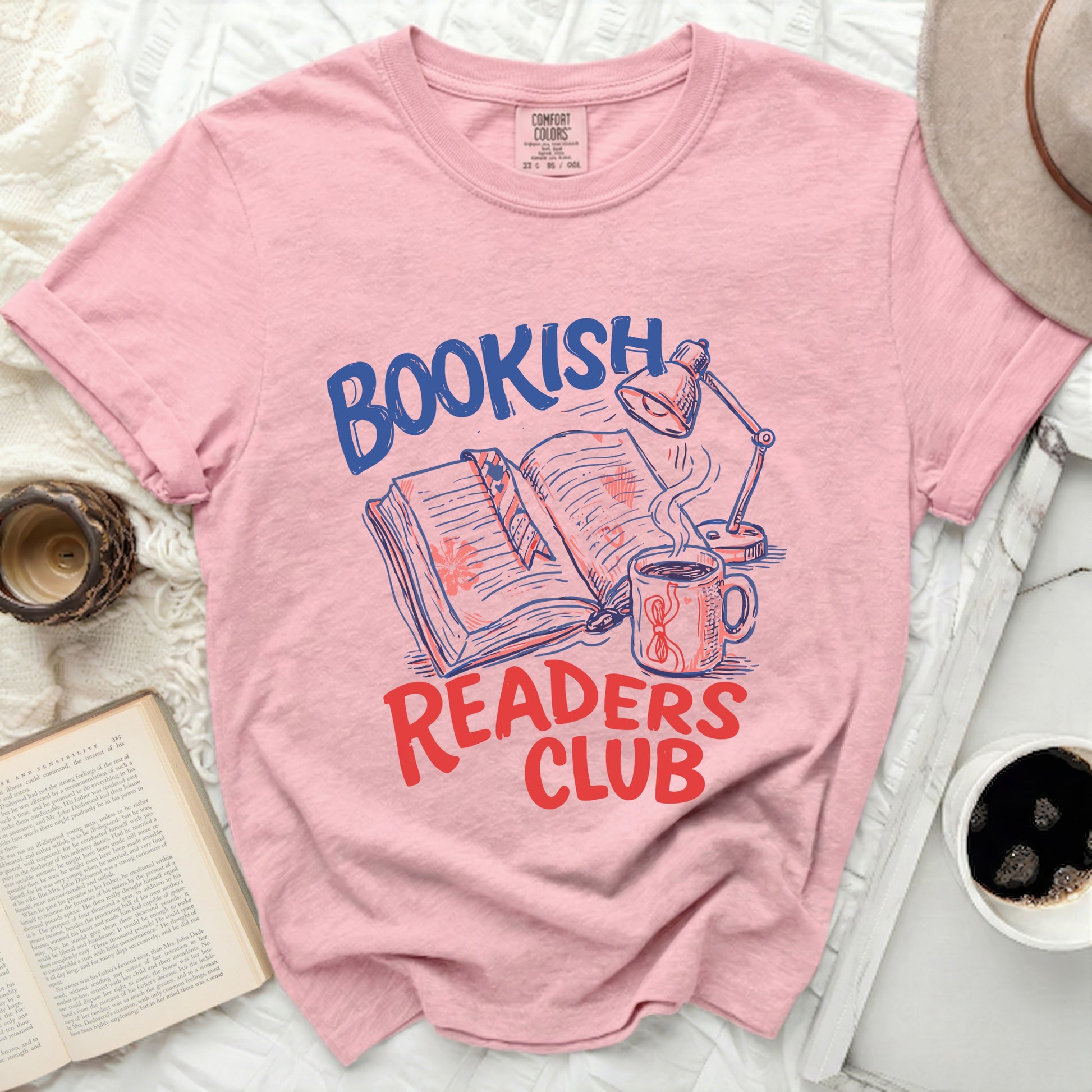 "Bookish Readers Club" graphic on a pink t-shirt.