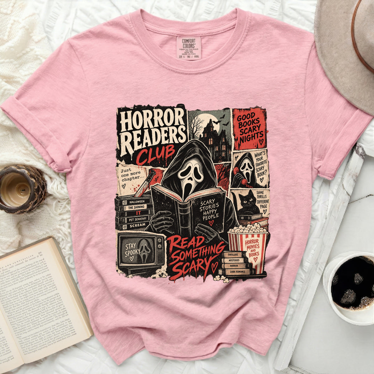 Pink t-shirt with "Horror Readers Club" graphic featuring a ghostface, books, and horror movie themes.