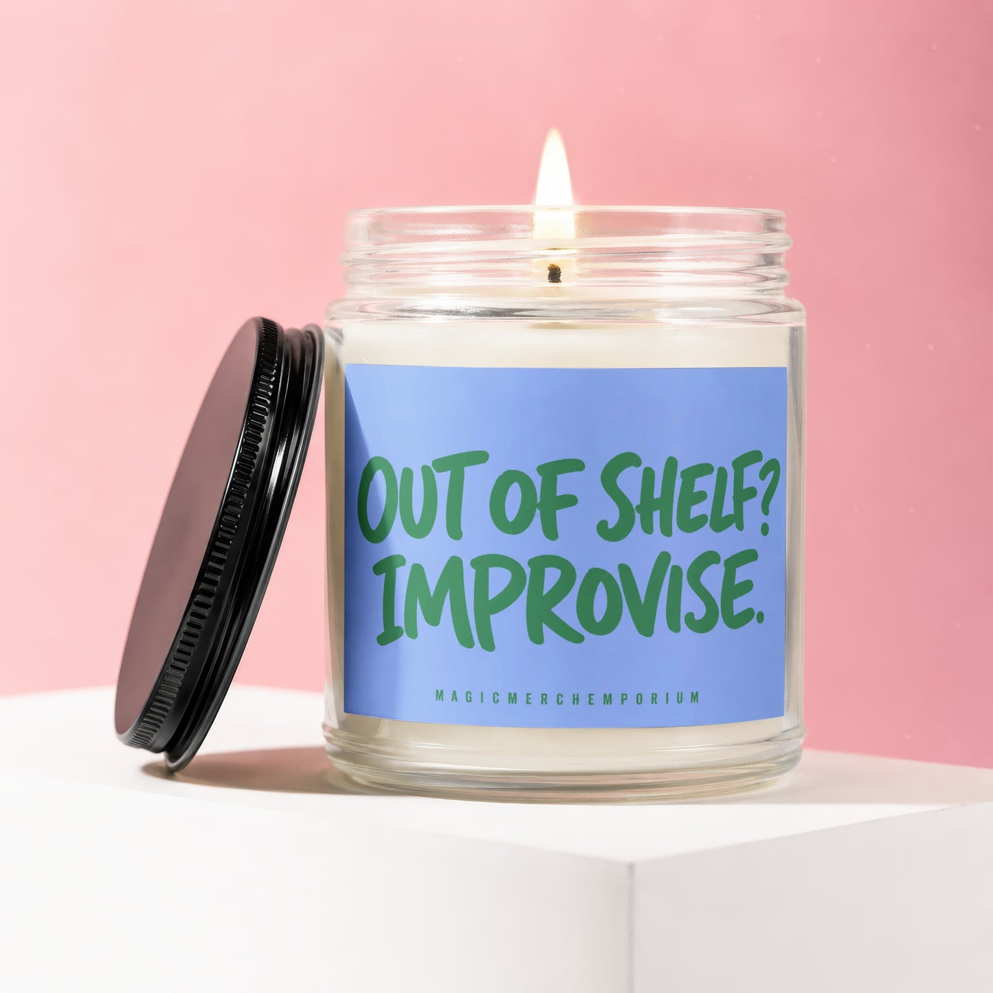 Scented candle in jar with lid off, reads "Out of shelf? Improvise."