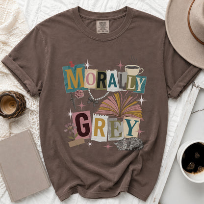 Brown t-shirt with "MORALLY GREY" text, open book, and sleeping cat graphic.