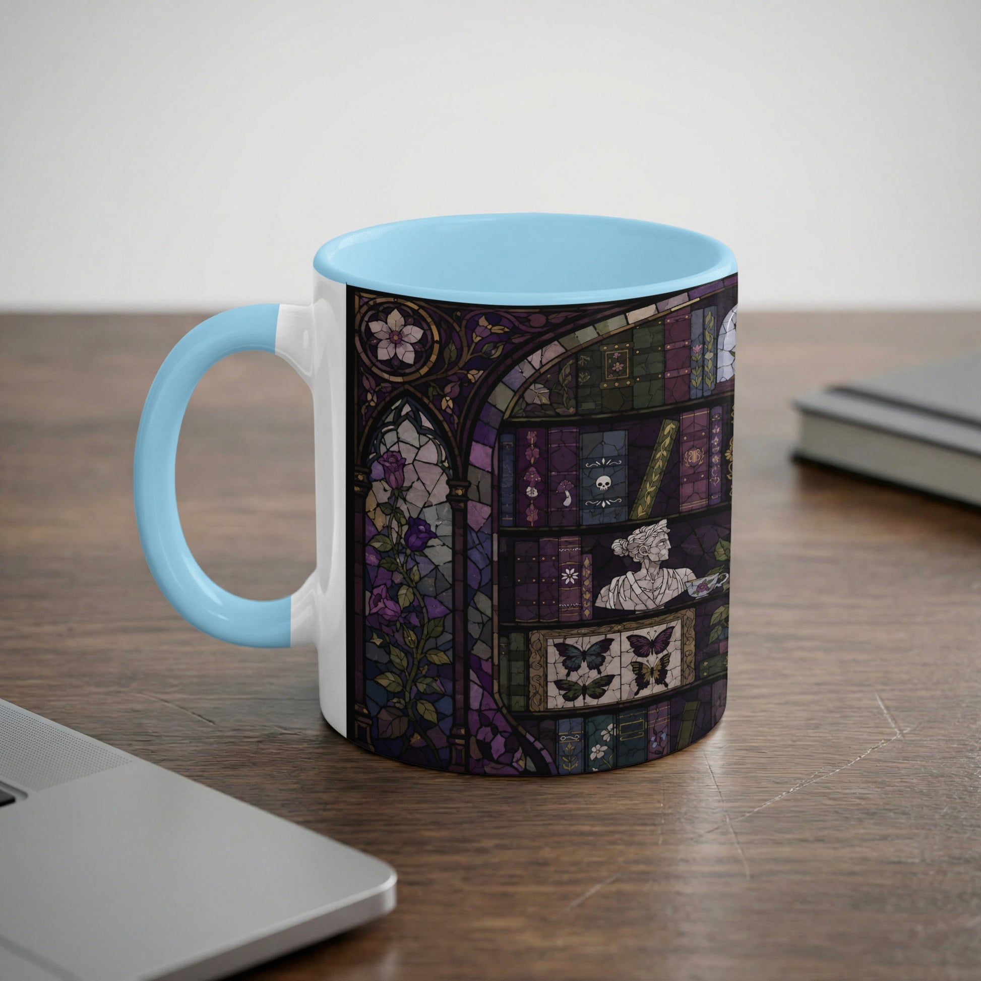 Mug with a gothic stained-glass design featuring books, a bust and butterflies.