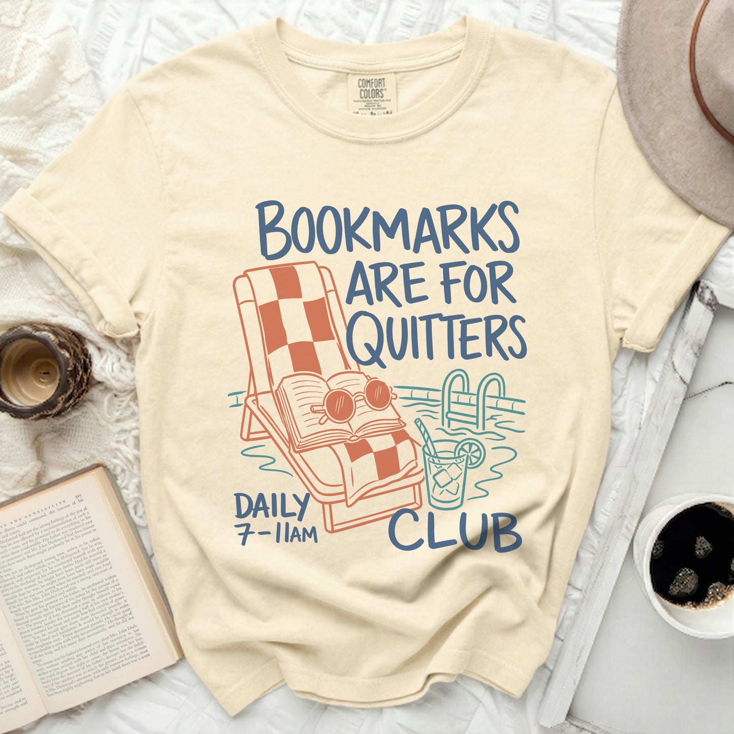T-shirt with "Bookmarks Are For Quitters" text and pool illustration.