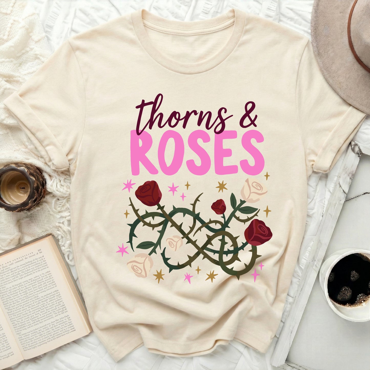 thorns & ROSES floral graphic cream shirt product type
thorns & roses, floral graphic, rose design, botanical tee, nature inspired, cream t-shirt, beige top, pink roses, red roses, starry design, graphic tee, flower shirt, unique apparel, romantic style, garden aesthetic, whimsical design, vintage floral, custom tee, pretty print, fashion top