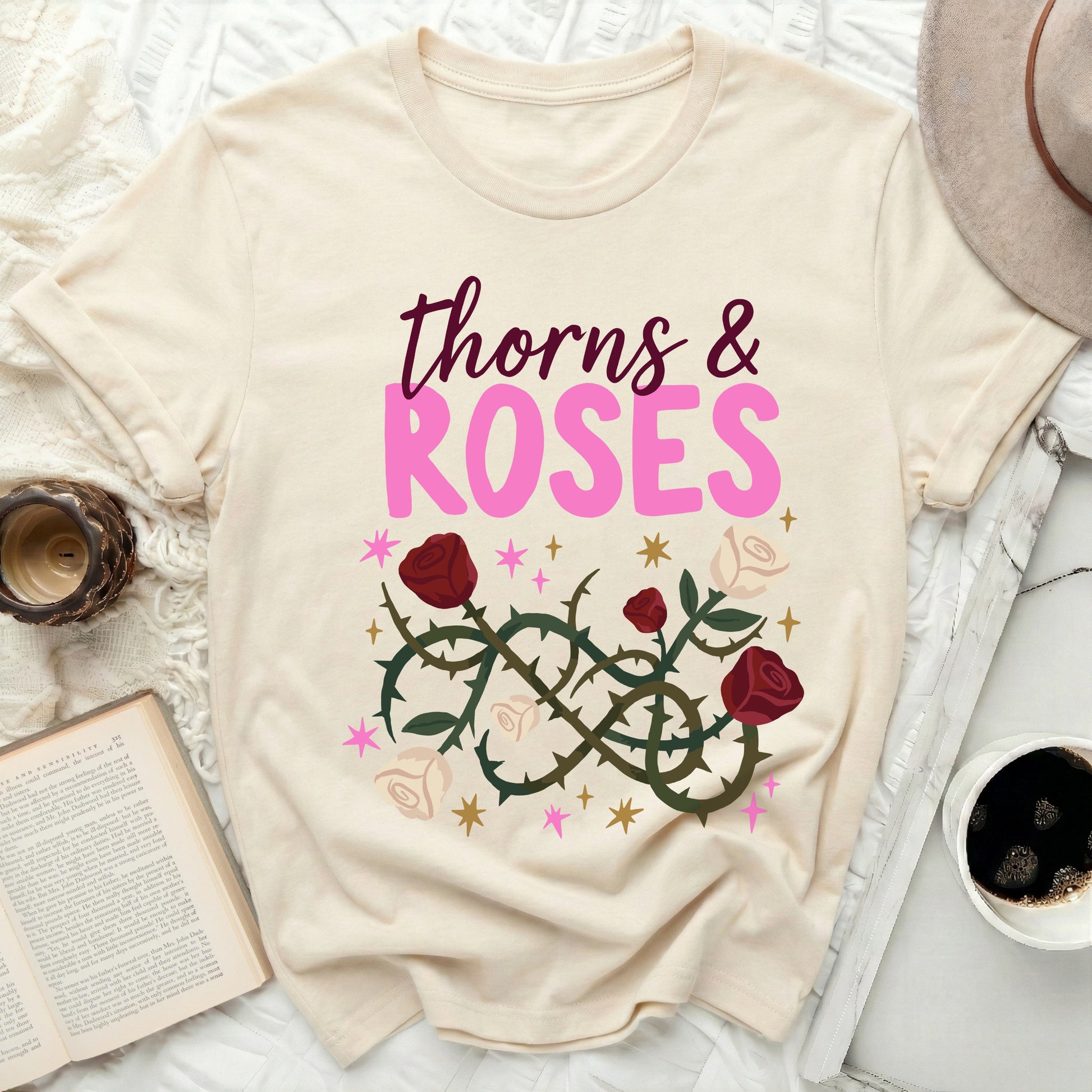 thorns & ROSES floral graphic cream shirt product type
thorns & roses, floral graphic, rose design, botanical tee, nature inspired, cream t-shirt, beige top, pink roses, red roses, starry design, graphic tee, flower shirt, unique apparel, romantic style, garden aesthetic, whimsical design, vintage floral, custom tee, pretty print, fashion top