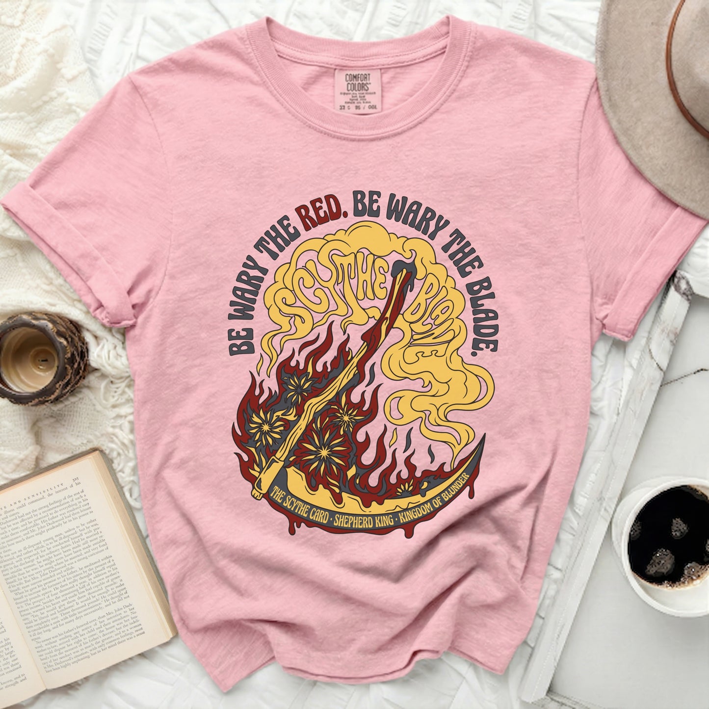 Pink t-shirt with yellow "Scythe Card" graphic and text.