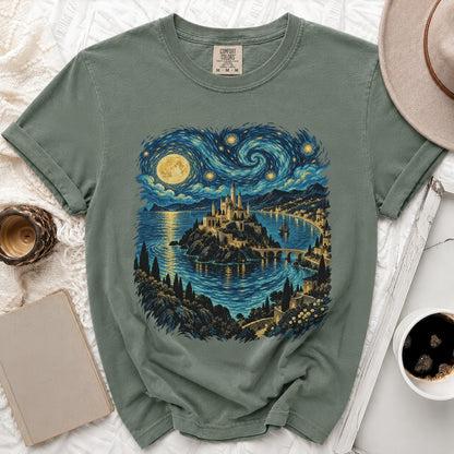 Green t-shirt with a castle by the sea under a swirling starry sky.