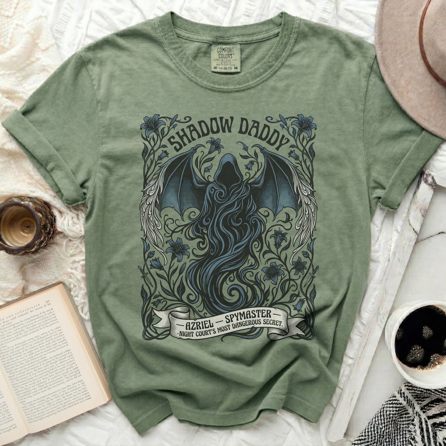 Green t-shirt with "Shadow Daddy Azriel - Spymaster" text and winged figure design.