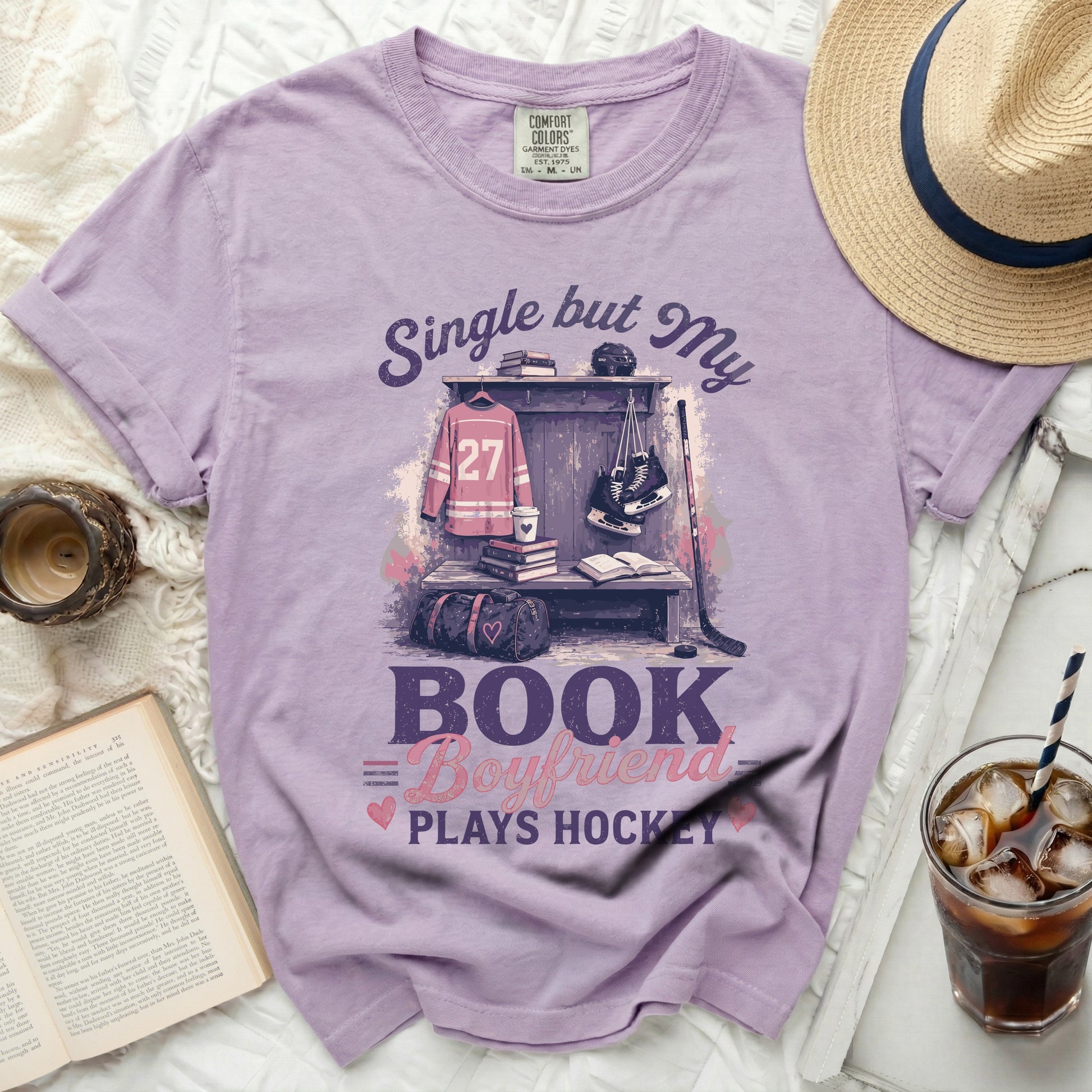 Purple t-shirt with "Single but My Boyfriend Plays Hockey" text and hockey gear graphic.