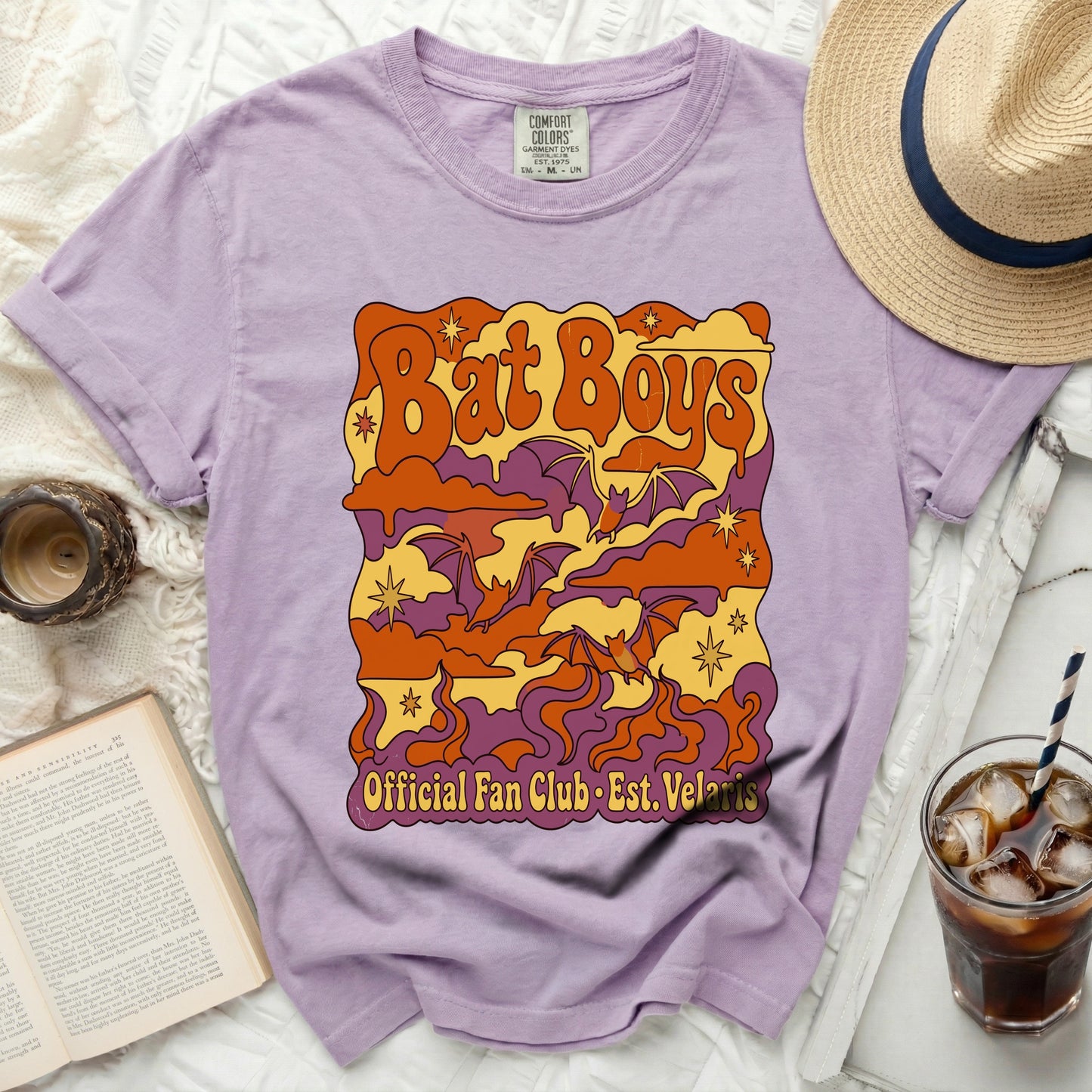 Lavender t-shirt with "Bat Boys Official Fan Club Est. Velaris" graphic.