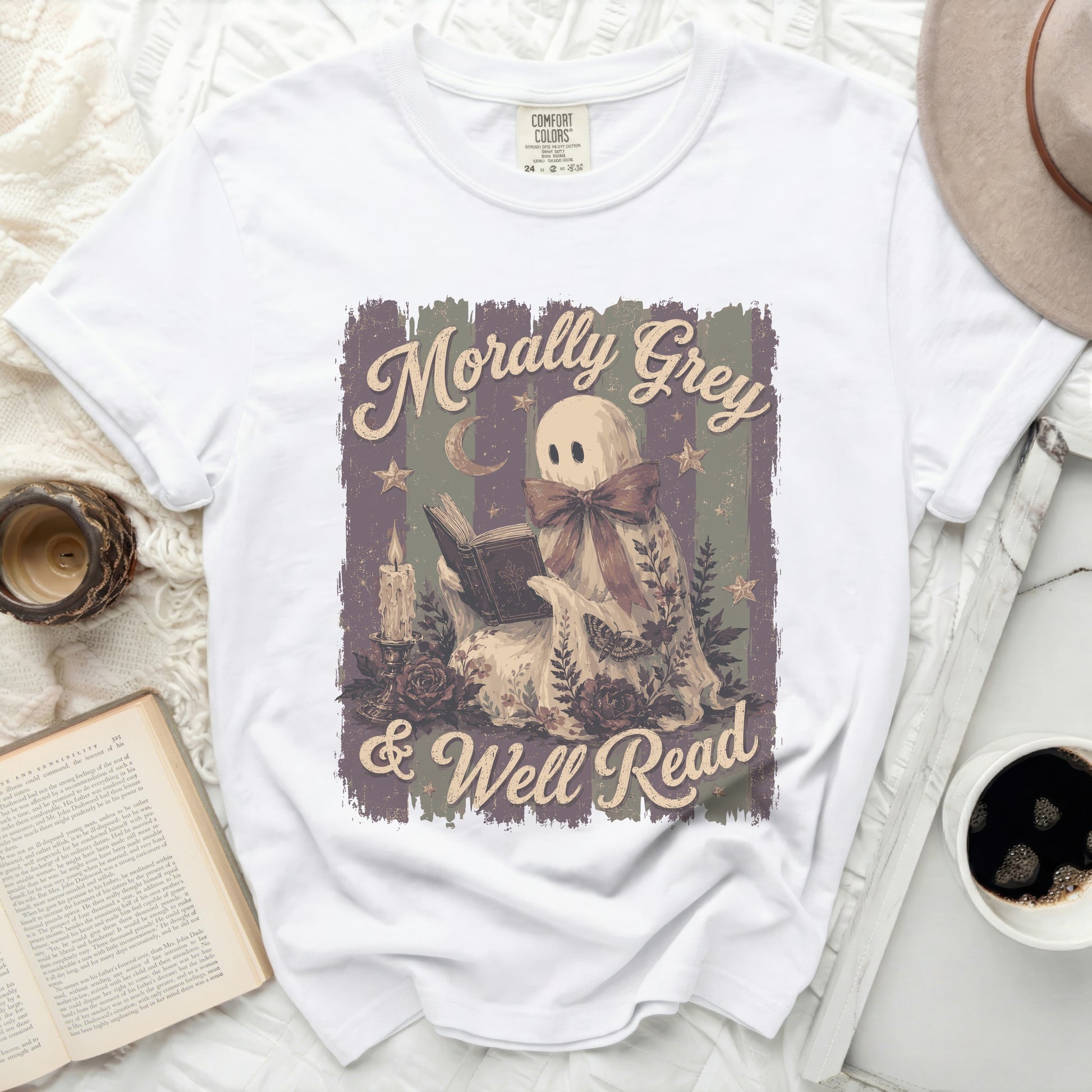 White t-shirt with ghost reading "Morally Grey & Well Read" graphic.