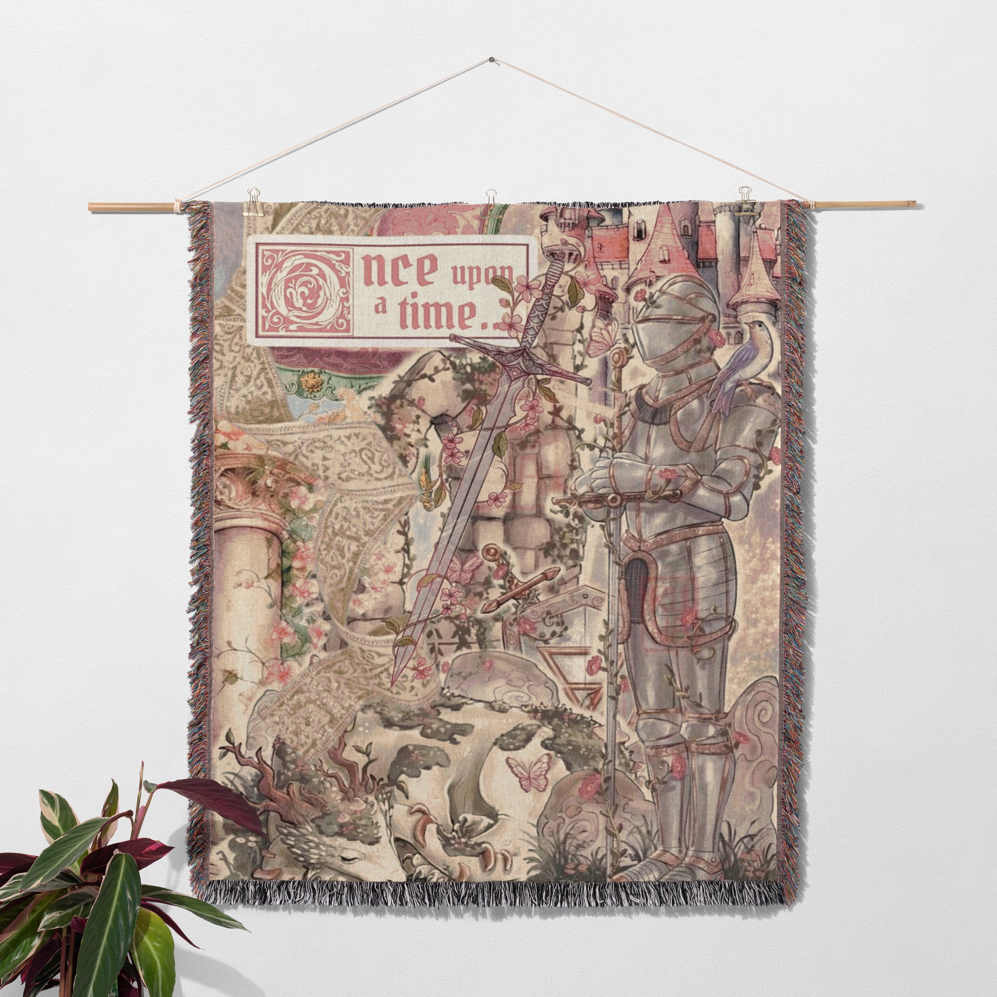 The image is a tapestry hanging on a wall, featuring a knight in shining armor and various fantastical elements such as a castle, flowers, and a dragon.