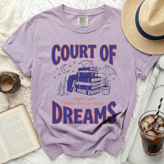 Purple t-shirt with "Court of Dreams Where the stars listen" text and book graphics.