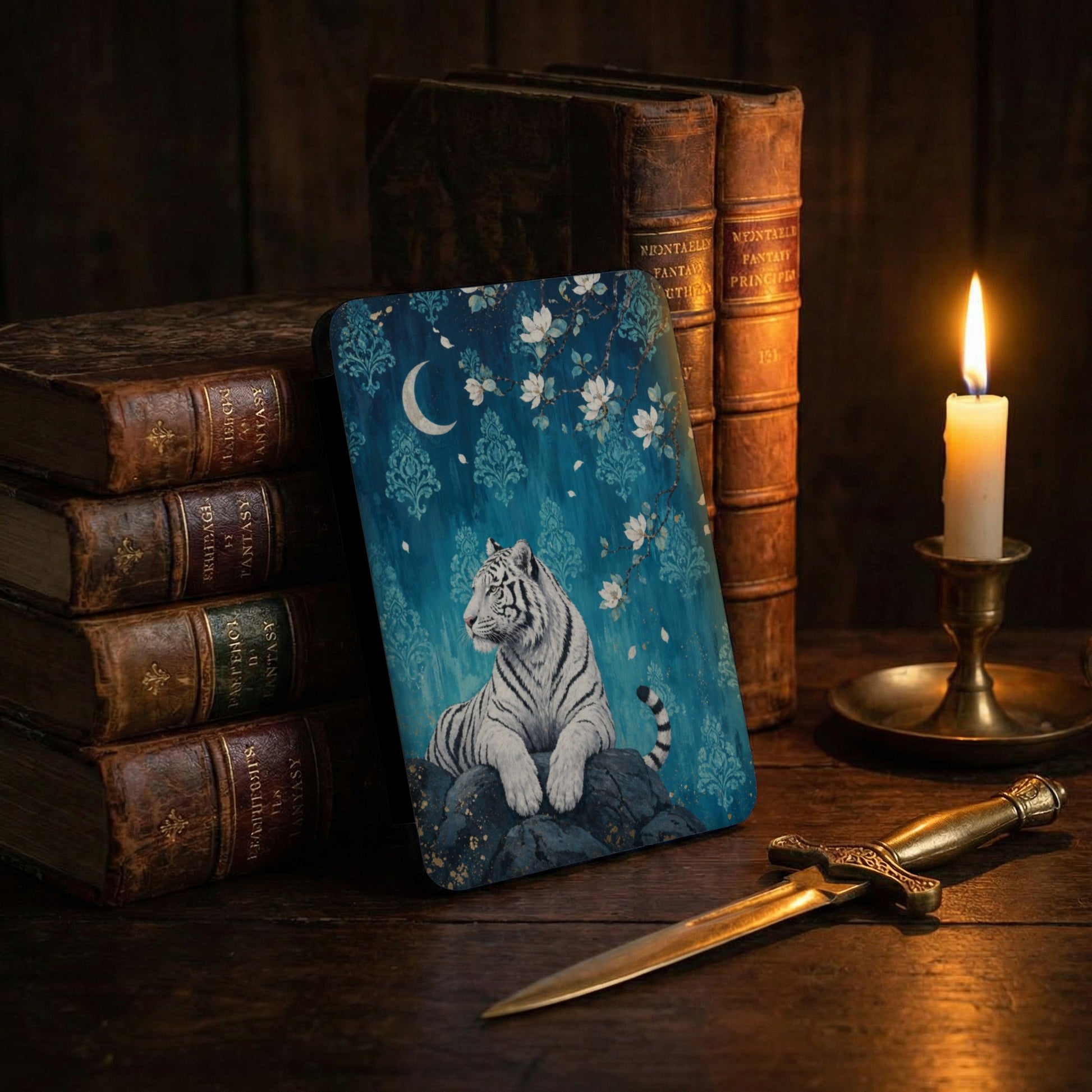 White tiger with crescent moon and flowers on a blue damask background.