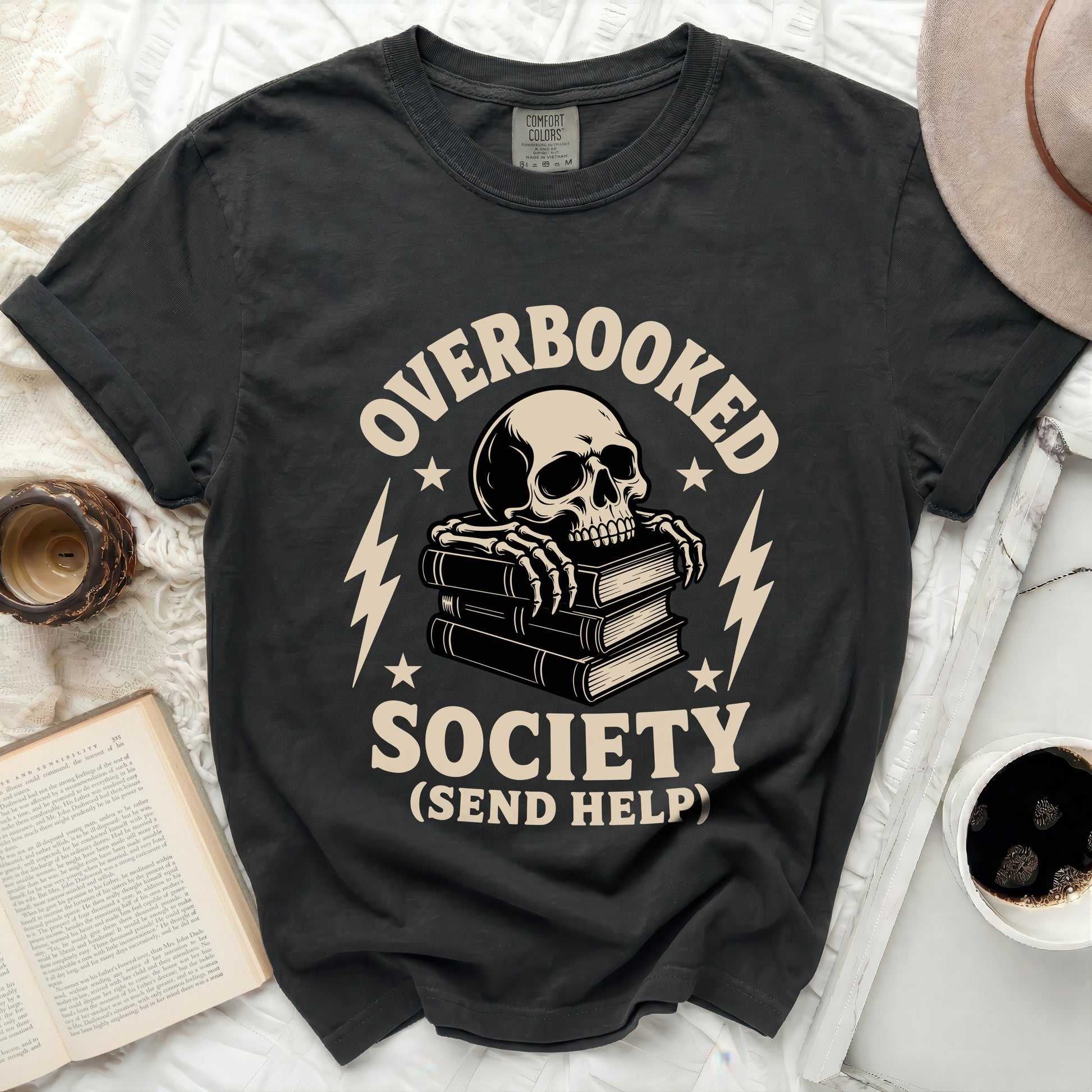 Overbooked Society skull and books graphic tee with text.