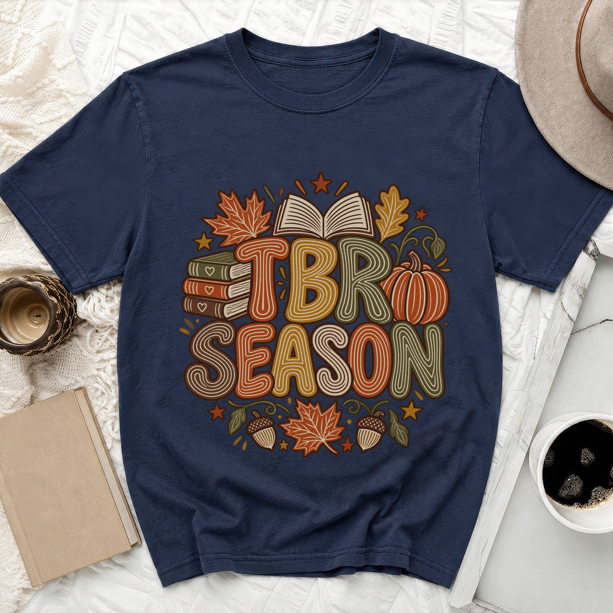 Navy t-shirt with fall-themed "TBR SEASON" graphic and an open book.