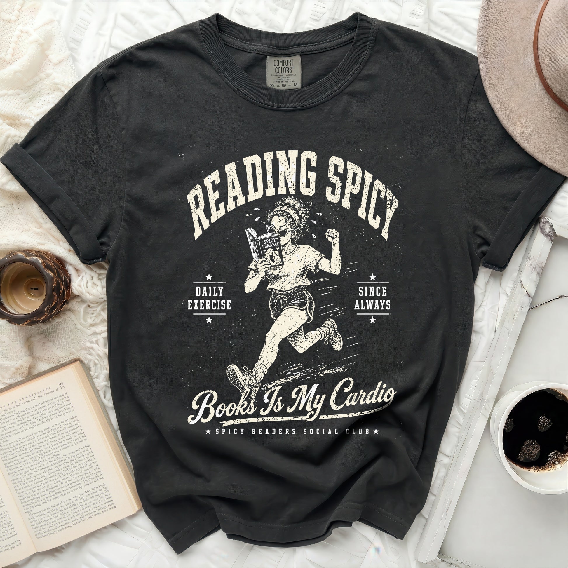 Black t-shirt with "Reading Spicy Books Is My Cardio" graphic.