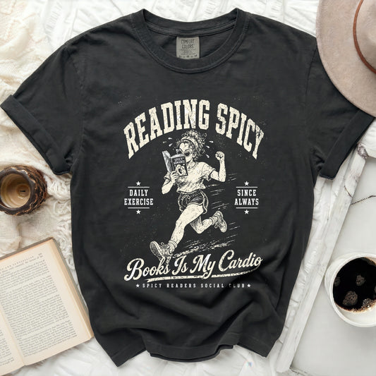 Black t-shirt with "Reading Spicy Books Is My Cardio" graphic.