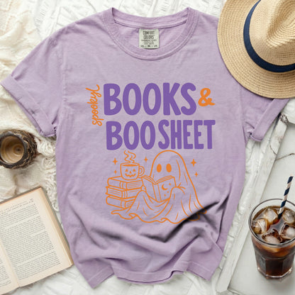 Purple t-shirt with orange "Spookyl BOOKS & BOO SHEET" graphic and ghost.