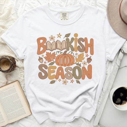 White t-shirt with "Bookish Season" text, pumpkin, and fall leaves graphic.