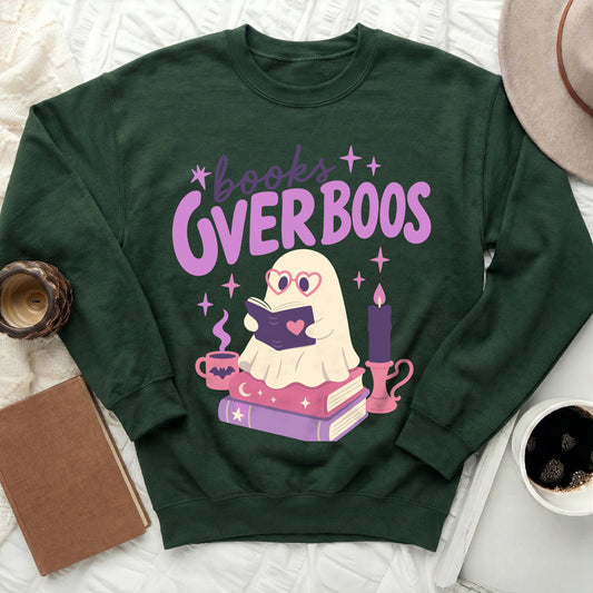 Green sweatshirt with "books over boos" text and a graphic of a ghost reading.