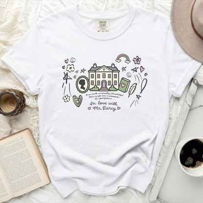 White t-shirt with "Pride and Prejudice" house illustration and text.