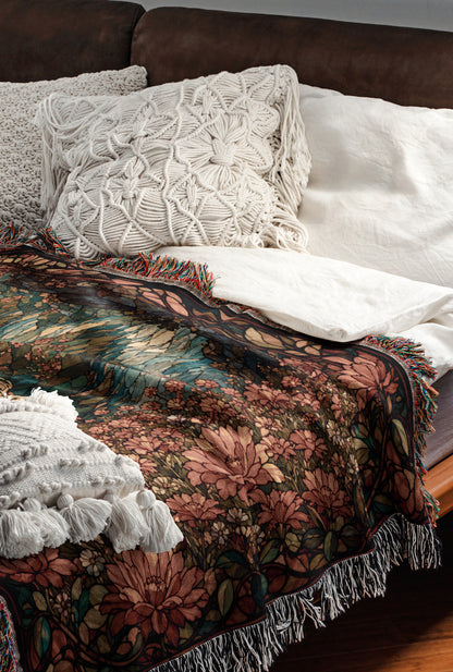 a cozy and inviting bedroom scene, featuring a bed with a floral patterned blanket and a white pillow. The bed is set against a brown leather headboard, creating a warm and comfortable atmosphere.