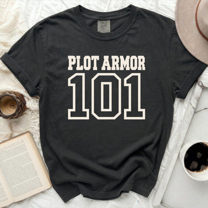 Dark grey t-shirt with "PLOT ARMOR 101" in white collegiate lettering.