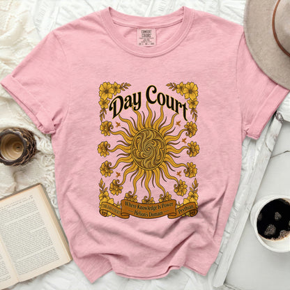 Pink t-shirt with "Day Court" and sun design, "Where Knowledge Is Power Helion's Domain"