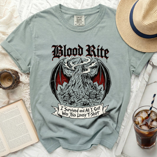 Light blue t-shirt with "Blood Rite" and a mountain graphic, with text "I Survived and All I Got Was This Lousy T-Shirt".