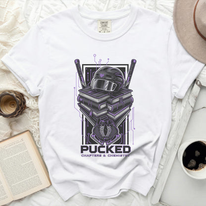 White t-shirt with "Pucked Chapters & Chemistry" text and hockey gear graphic.