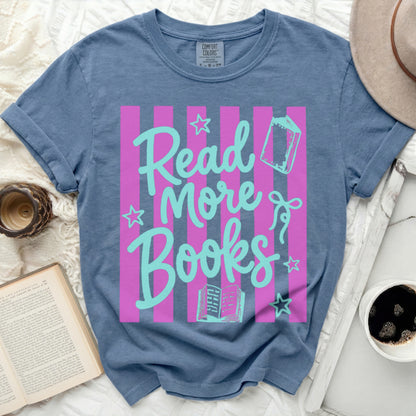 Blue t-shirt with "Read More Books" in pink and mint green lettering.