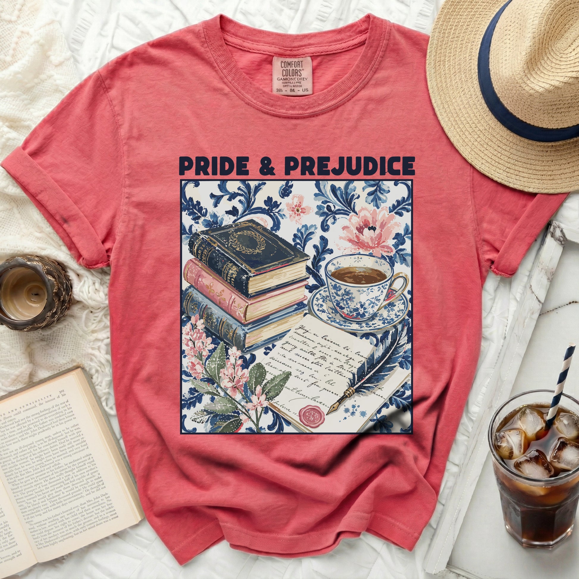 Red t-shirt with "Pride & Prejudice" and a vintage illustration of books and tea.