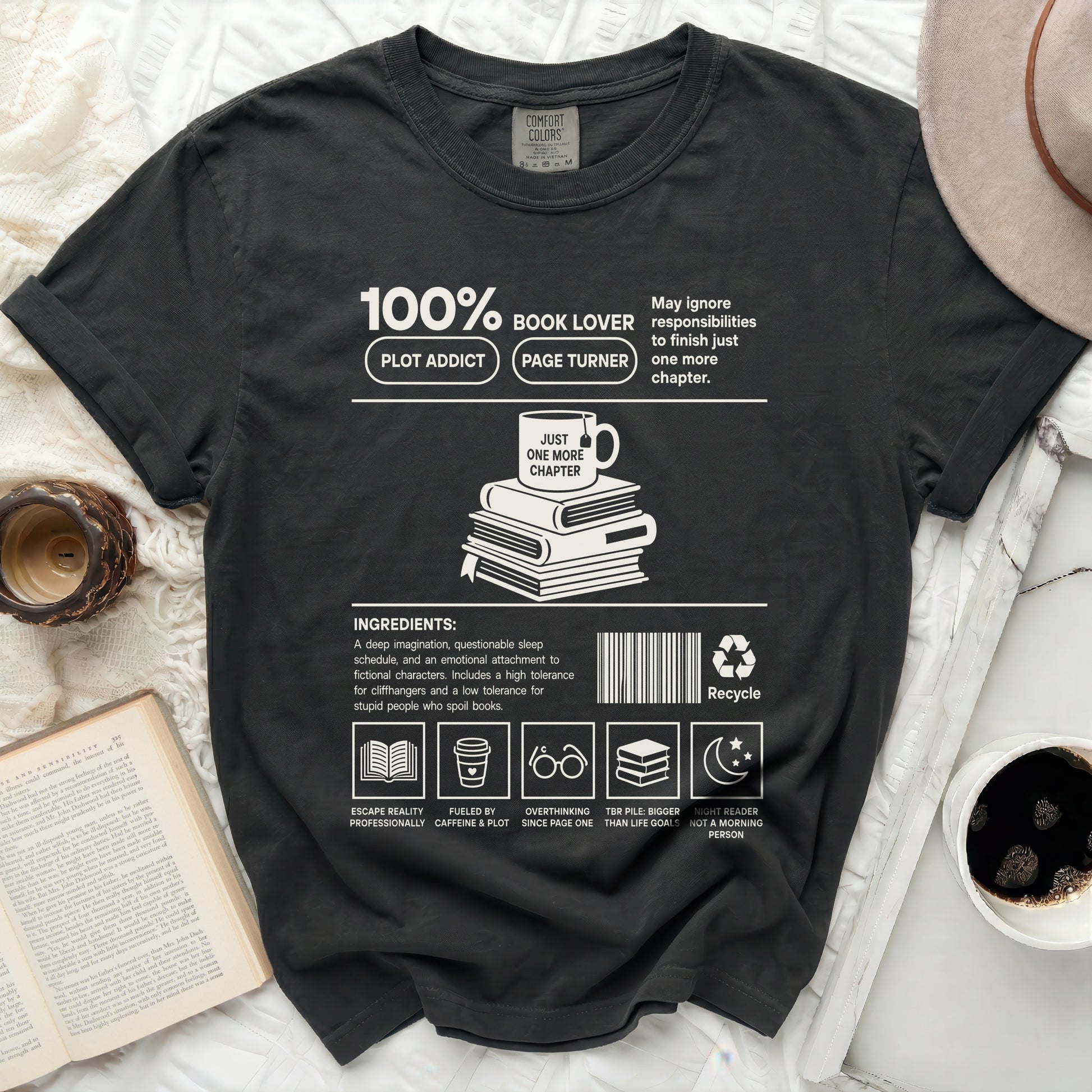 Black t-shirt with "100% Book Lover" graphic and reading-related ingredients.