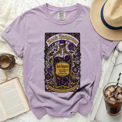 Purple t-shirt with "Book Hangover" and potion bottle graphic.