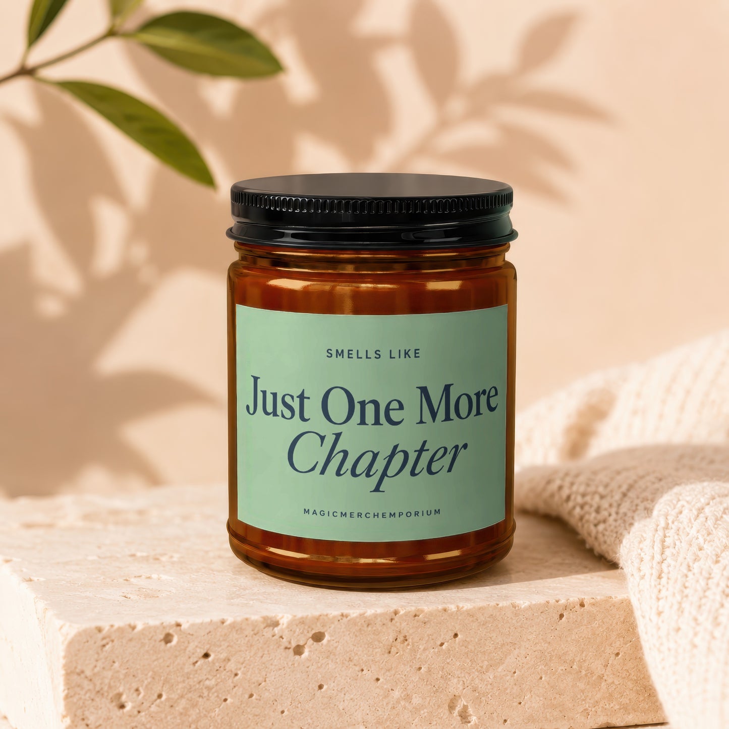 Candle with label "Smells Like Just One More Chapter" by MagicMerchEmporium.