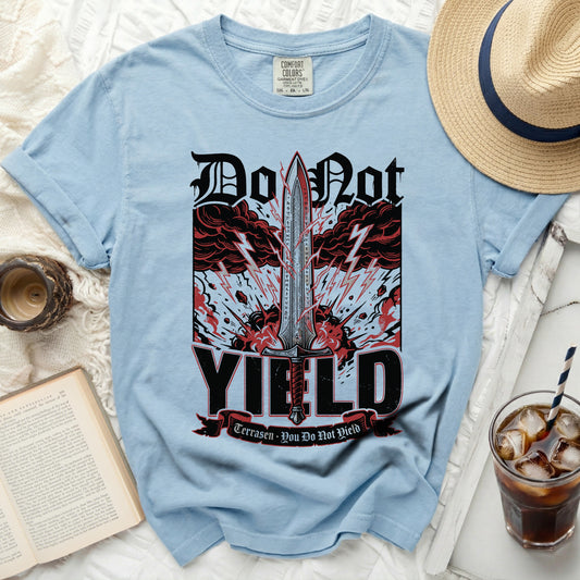 Light blue t-shirt with graphic of sword, clouds, and text "Do Not YIELD Terrasen - You Do Not Yield".