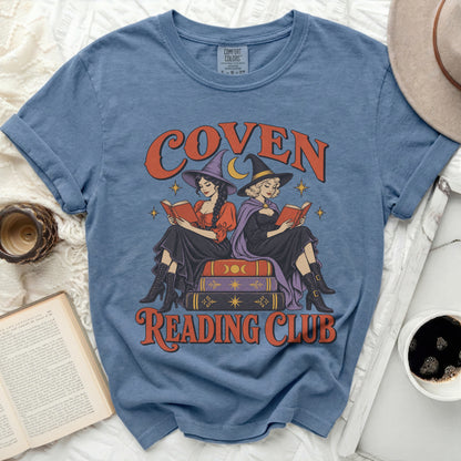 T-shirt graphic with witches reading, text "COVEN READING CLUB" and moons.