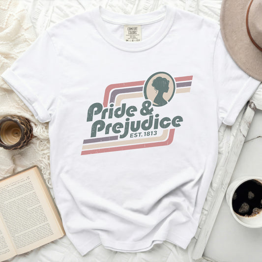 White t-shirt with "Pride & Prejudice EST. 1813" graphic and silhouette.