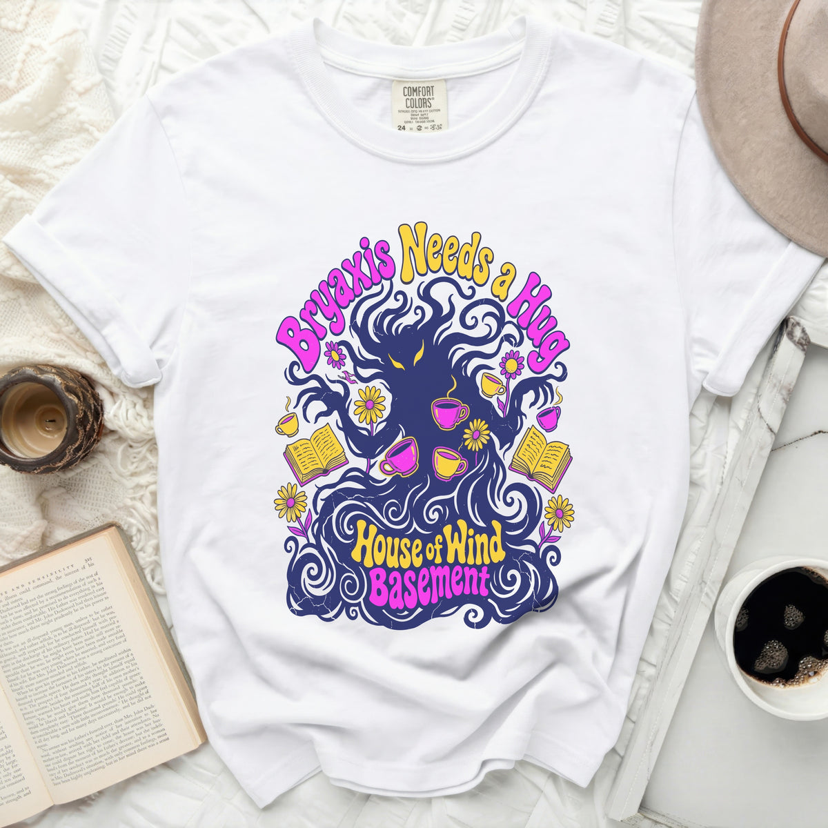 White t-shirt with "Bryaxis Needs a Hug" and "House of Wind Basement" graphic.
