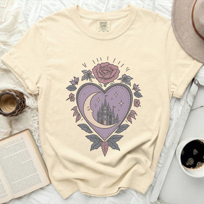 Cream t-shirt with a vintage heart graphic featuring moon, castle, and rose.