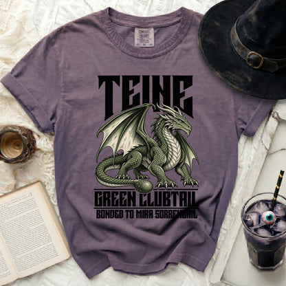 Purple t-shirt with a green dragon graphic and "TEINE, GREEN CLUBTAIL, BONDED TO MIRA SORRENGAIL" text.