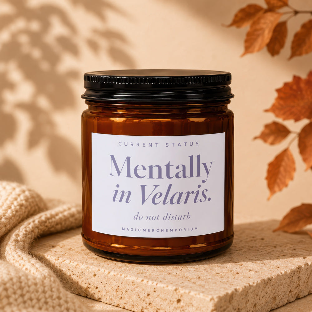 Amber candle with label reading "Mentally in Velaris." and "do not disturb."