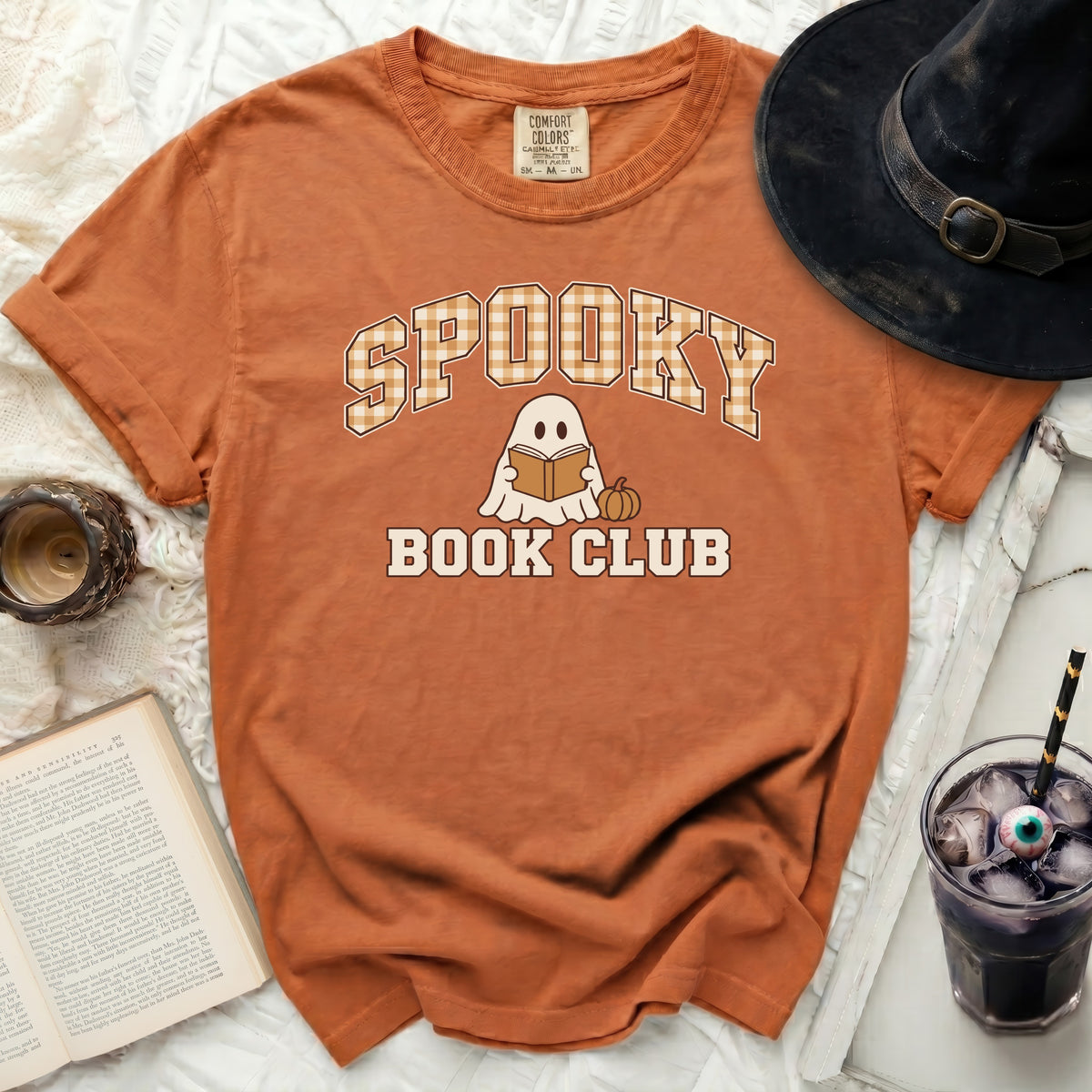Orange t-shirt with "Spooky Book Club" text, ghost, and pumpkin graphic.