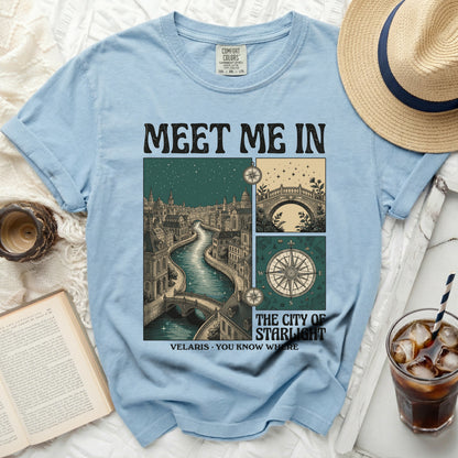 Light blue t-shirt with "Meet Me In The City Of Starlight Velaris" graphic.