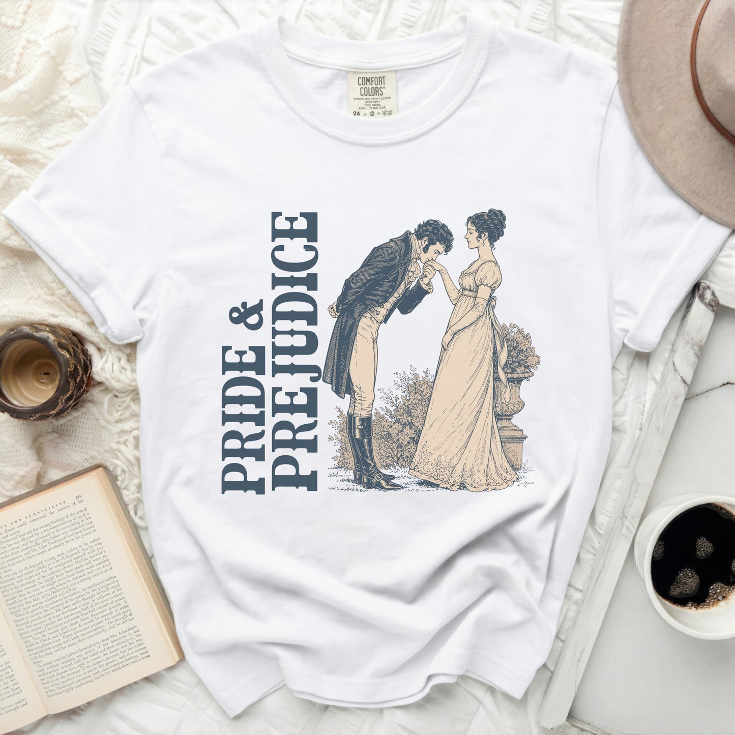 White t-shirt with "Pride & Prejudice" text and historical couple illustration.