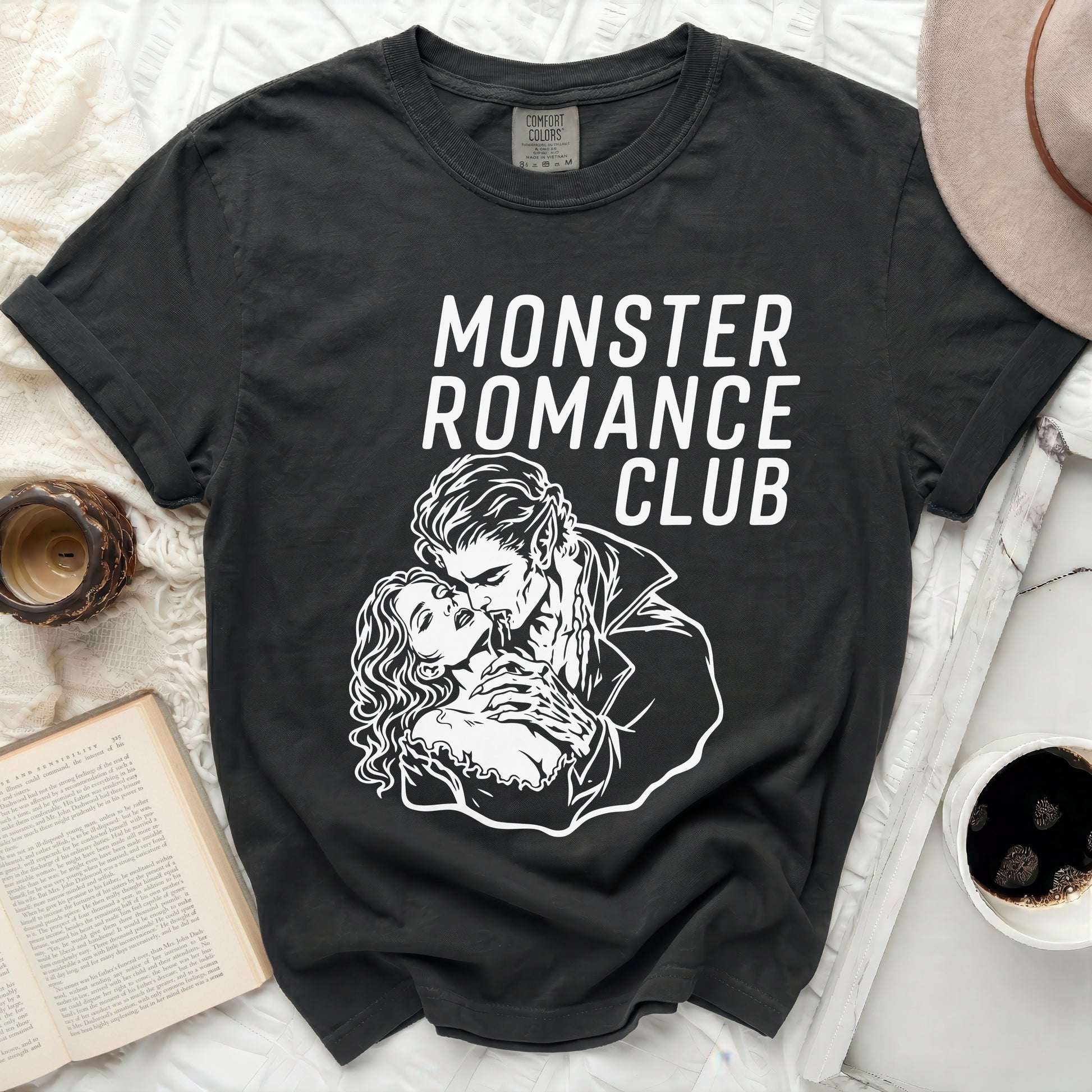 Black t-shirt with "Monster Romance Club" text and vampire couple graphic.