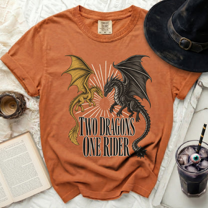 Orange t-shirt with graphic of two dragons and text "TWO DRAGONS ONE RIDER".