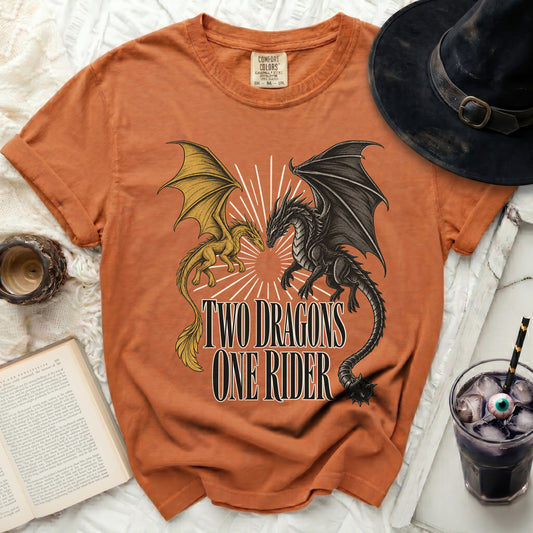 Orange t-shirt with graphic of two dragons and text "TWO DRAGONS ONE RIDER".