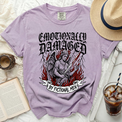 Lilac t-shirt with angel graphic and text "Emotionally Damaged By Fictional Men".
