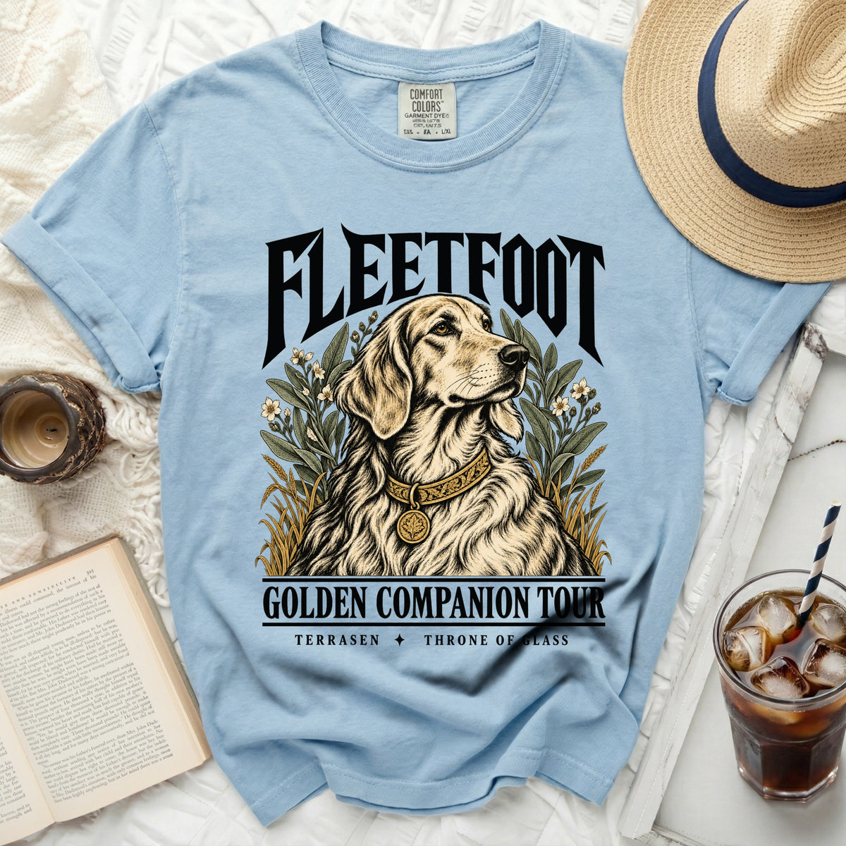 Light blue t-shirt with "Fleetwood Golden Companion Tour" and dog graphic.